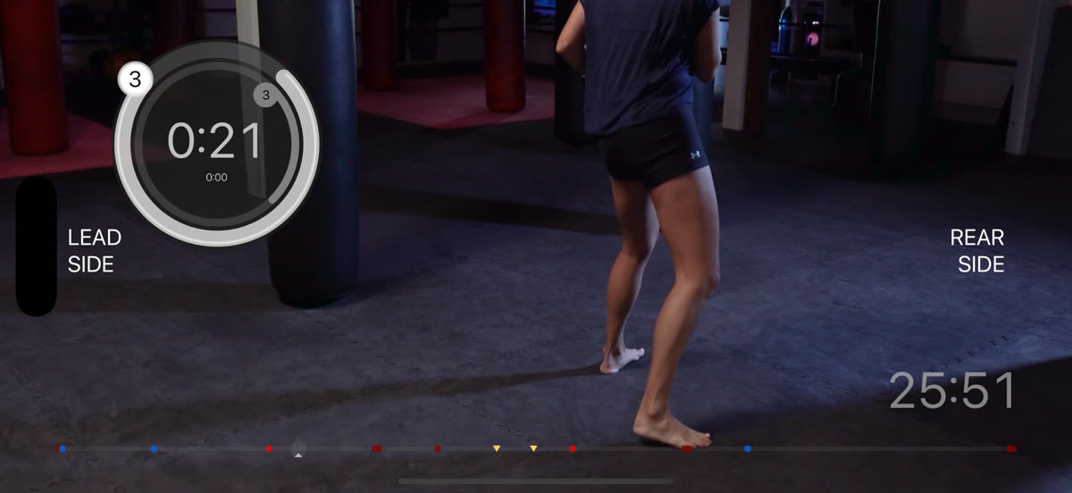 A heavy bag round in the workout video with the round timer counting down